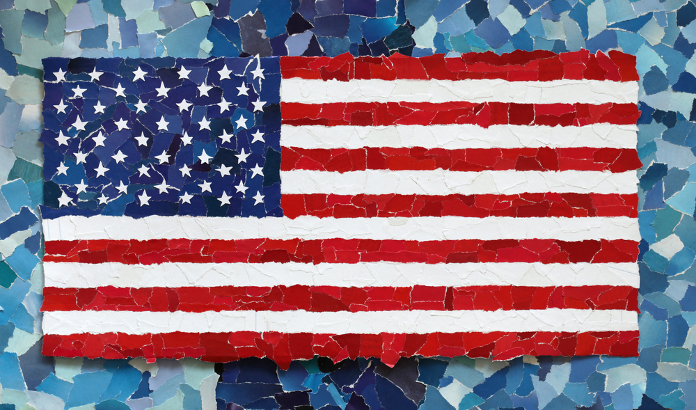 bits of paper arranged to form the american flag on a blue background